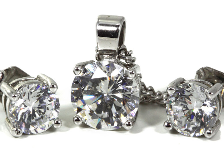 three similar looking diamond studs