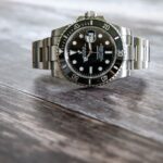 rolex on wood panels
