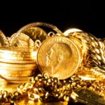 pile of gold coins and jewelry