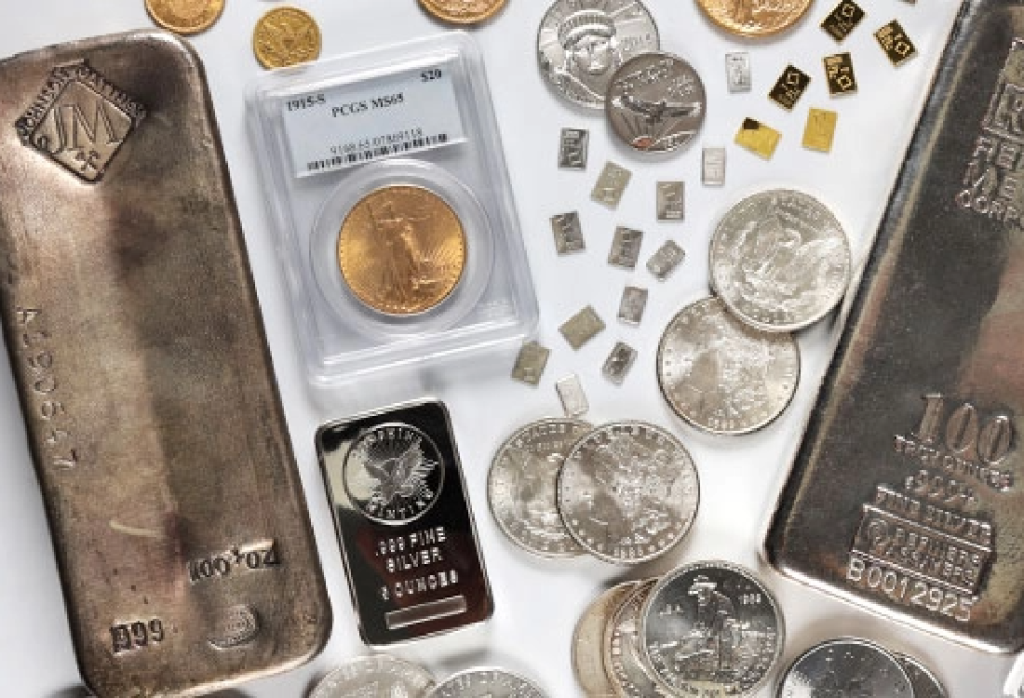 Coins and bullion with a white background